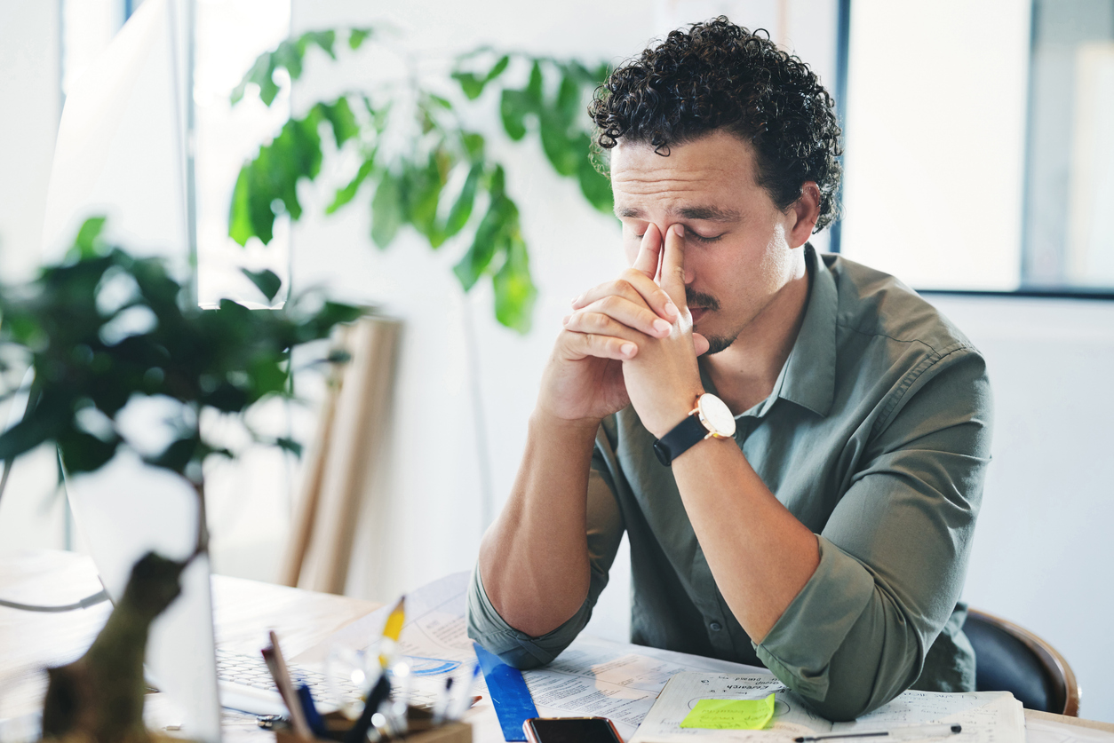 business owner having a headache